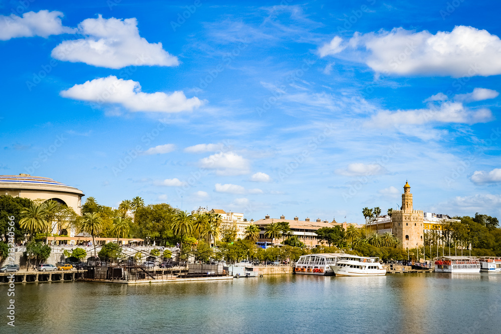 Cityscape of Seville City (Andalusia, Spain) from the shore of the Guadalquivir River