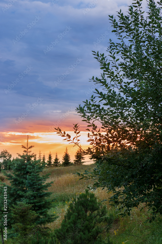 A beautiful colorful sunset in the countryside A beautiful colorful sunset in the countryside