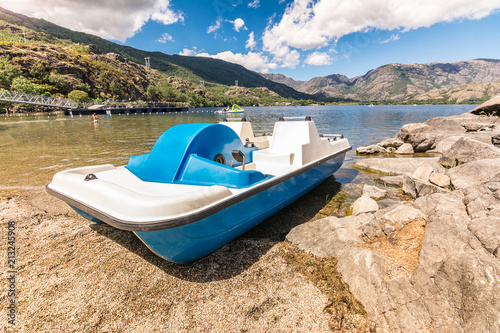 Boat pedal in the lake of Sanabria in Zamora (Castilla y Leon, Spain photo