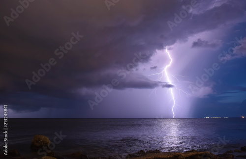  Lightning on the night sky and the sea © Liubomir