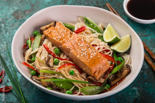 salmon with noodles and vegetables