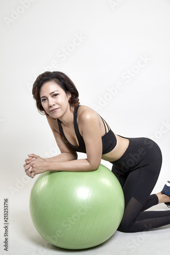 Asians woman exercise on fitness ball