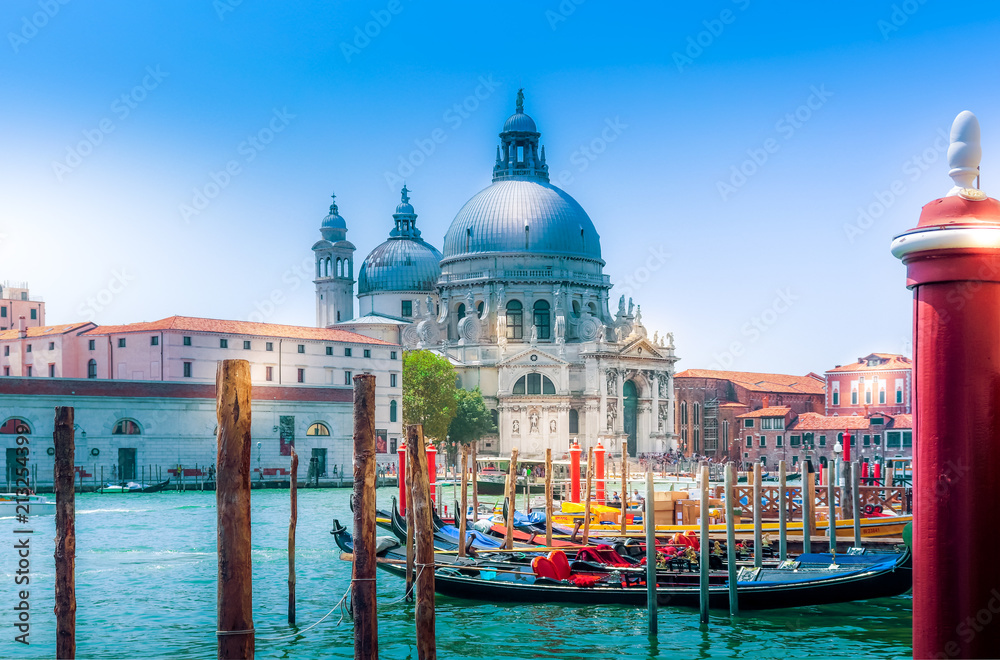 Venice view on church Basilica di Santa Maria della Salute and canal with gondolas