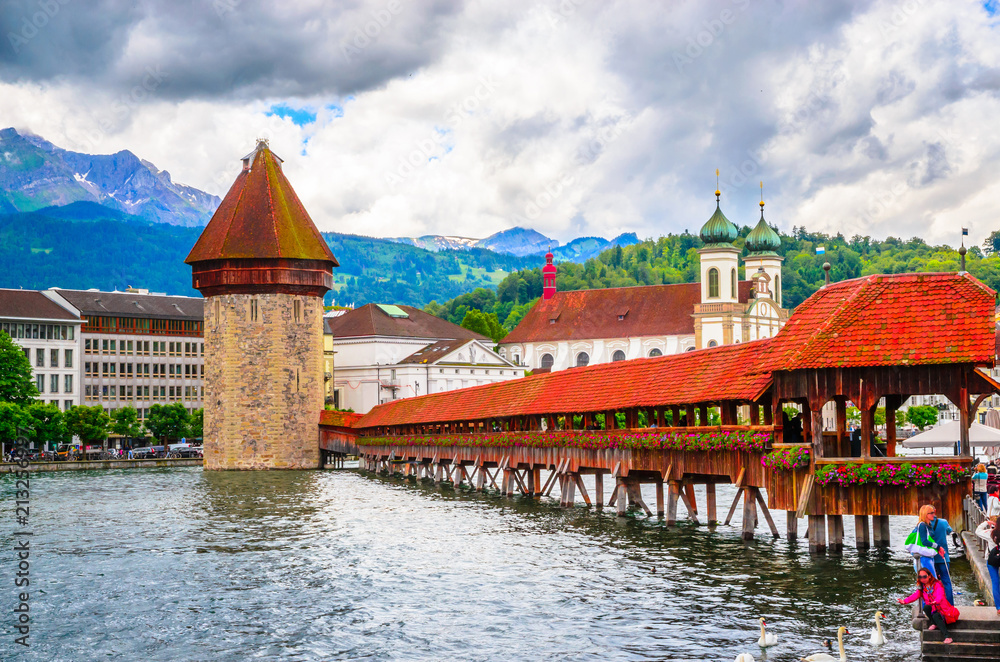 City center with famous Chapel Bridge and lake in Lucerne, Switzerland City center with famous Chapel Bridge and lake in Lucerne, Switzerland