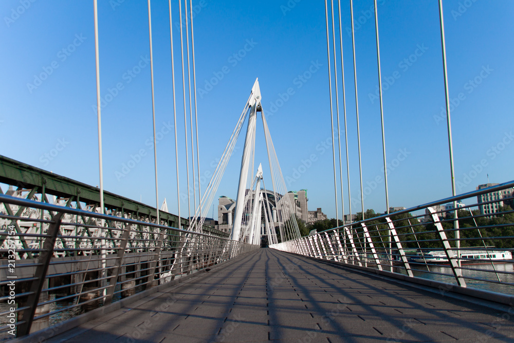 Low perspective of geometric bridge on a sunny day