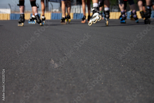 Track with inline skaters racing