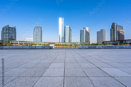 panoramic city skyline with empty square © THINK b