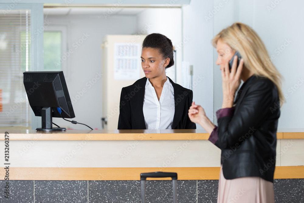 guest at the front desk guest at the front desk