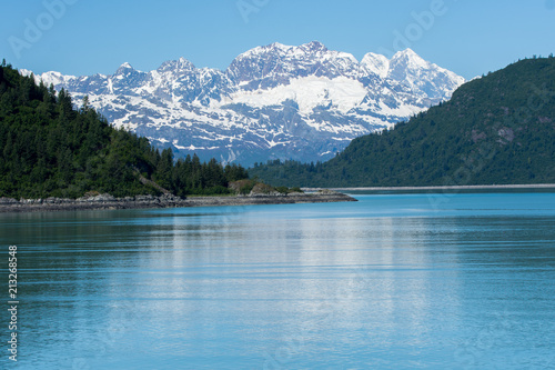 A view in Glacier Bay, Alaska of the snow capped moutains