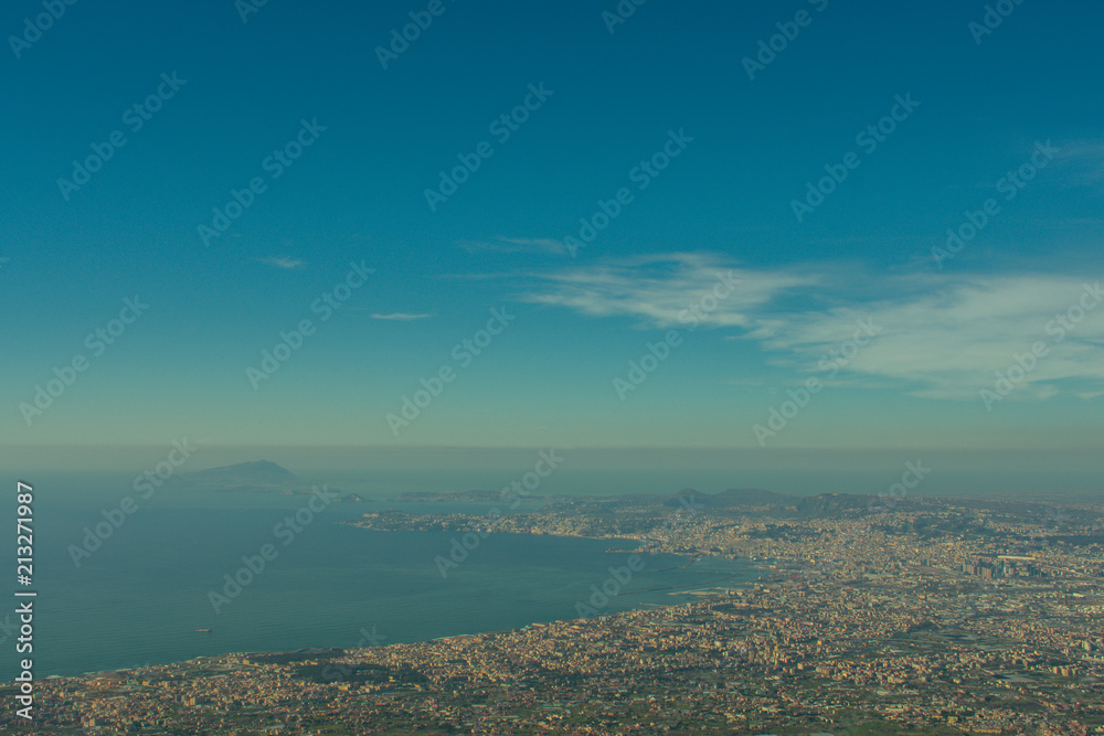 view on city from mount Vesuvius volcano in Italy. coast of sea and city from above 