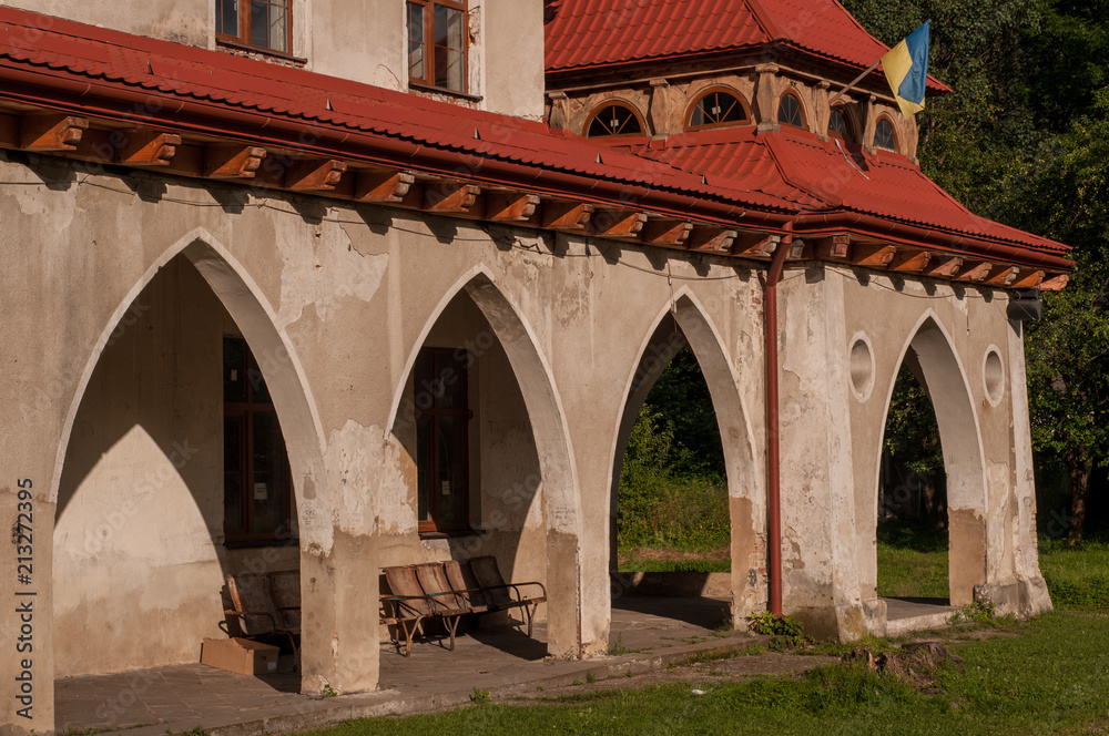 Fototapeta premium Old building of train station in Tatariv, Ukraine