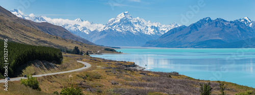 Panoramic view of Mount Cook mountain range with the beautiful turquoise waters of Lake Pukaki  South Island  New Zealand