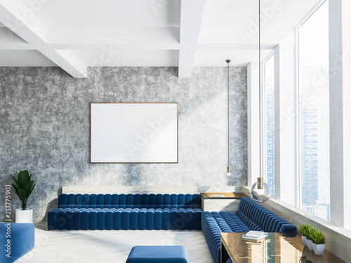 Concrete living room interior, blue sofa, poster