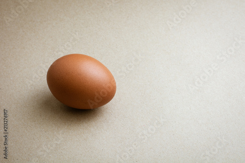 Brown chicken eggs on recycled craft paper