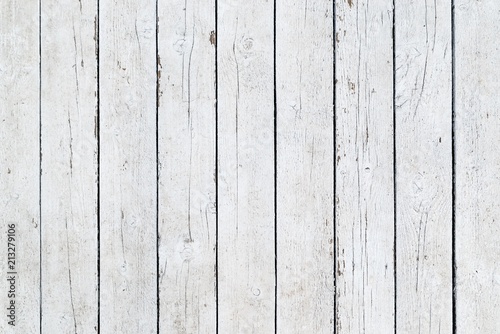 White texture of wooden boards with black slits