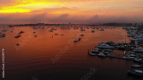 Silhouettes of Fishing Boats in the Harbor photo