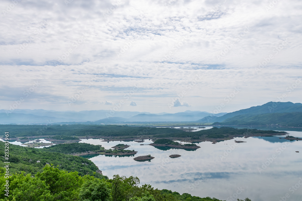 A picturesque lake with clear water in the mountains.