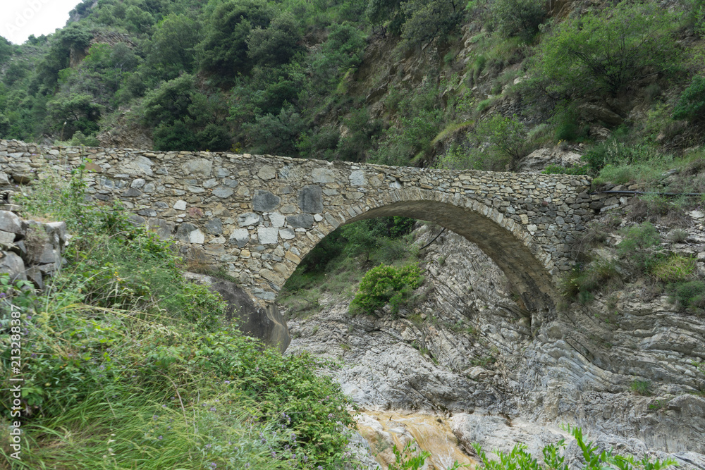 Stone bridge in mountains in the Nervia Valley