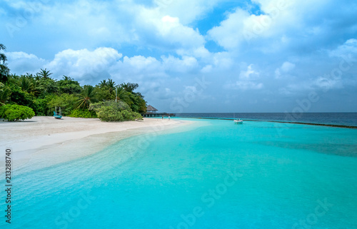 Luxury beach on the paradise island in the Indian ocean. Vacation deluxe. Summer travel. Maldives