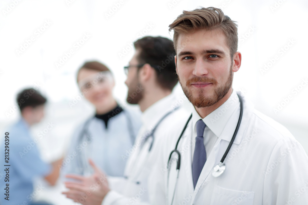 Portrait of friendly male doctor smiling Portrait of friendly male doctor smiling