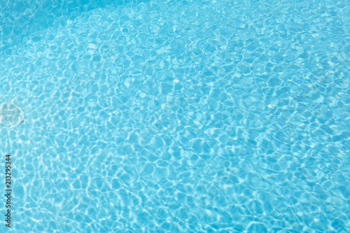 Blue water in the pool and the bottom.