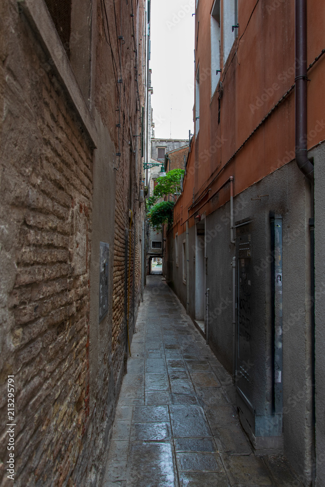 Narrow street in Venice Italy 