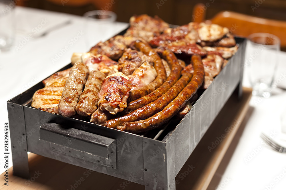 meat on barbecue grill served in restaurant