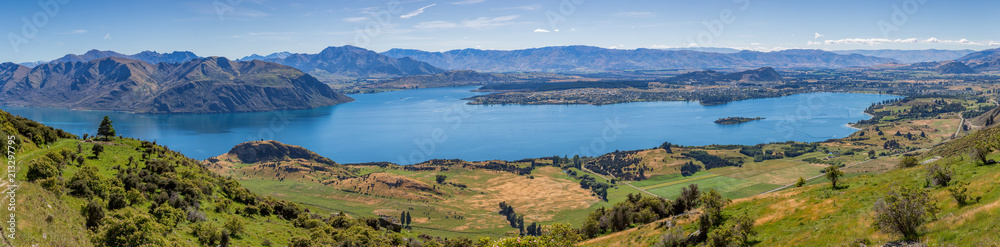 Panoramic view of Wanaka and the surrounding lake and mountain range, from the Roy's Peak track in New Zealand