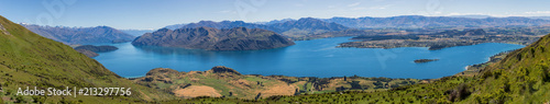 Panoramic view of Wanaka and the surrounding lake and mountain range  from the Roy s Peak track in New Zealand