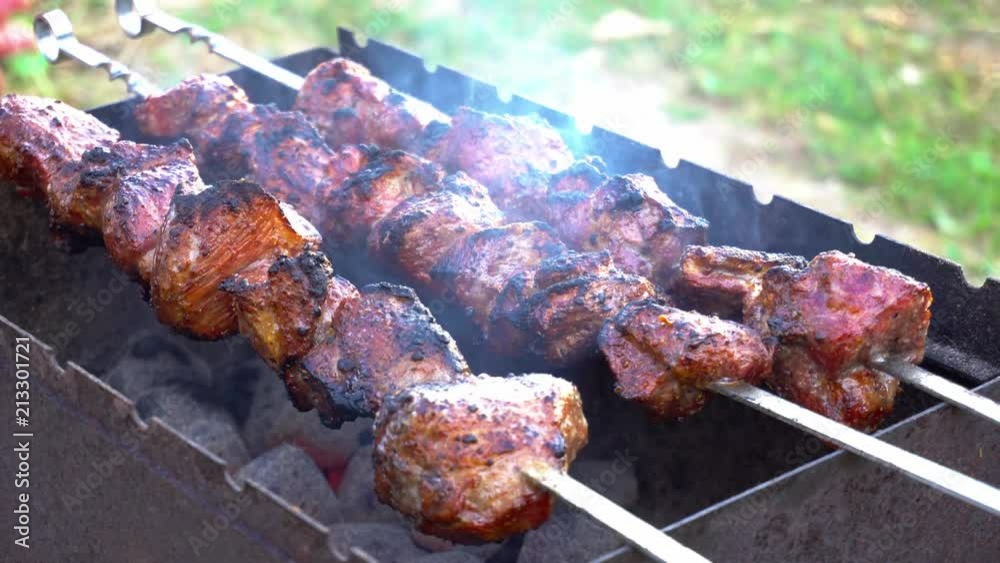 Roasting meat barbecue on the grill Roasting meat barbecue on the grill