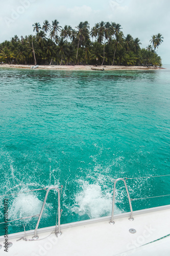 Splash from a person diving off a boat into the turquoise paradise waters of the San Blas Islands  Panama