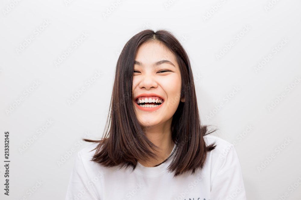 Laughing of asian beautiful positive thinking women with short hair Laughing of asian beautiful positive thinking women with short hair