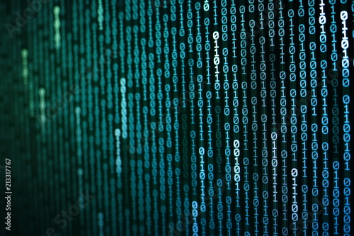 blue led display screen showing one and zero number binary code data. internet information transfers concept background for technology advancement work.