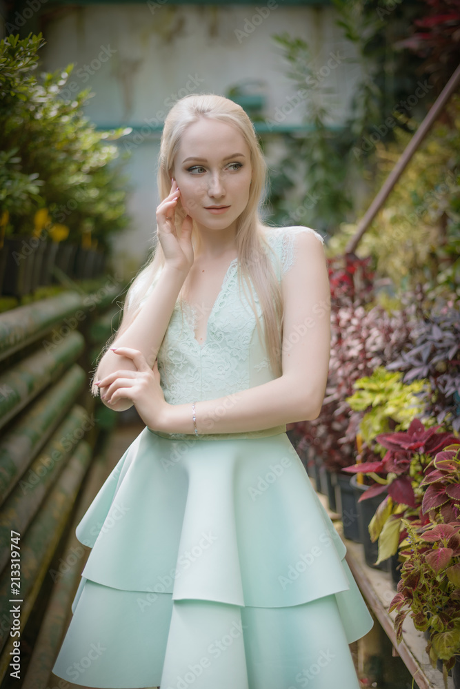 Summertime portrait of beautiful young woman. Selective focus. Summertime portrait of beautiful young woman. Selective focus.