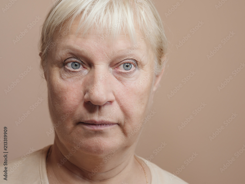 Close-up portrait of surprised middle aged woman. Close-up portrait of surprised middle aged woman.