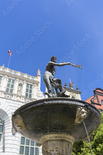 Neptune's Fountain Statue at Long Market Street by the entrance to Artus Court, Gdansk, Poland