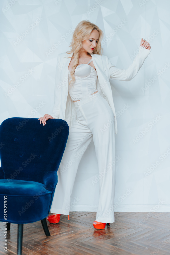 business portrait of a blond woman with bright make-up. business portrait of a blond woman with bright make-up.