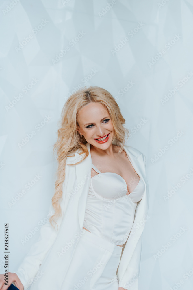business portrait of a blond woman with bright make-up. business portrait of a blond woman with bright make-up.