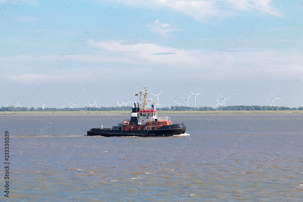 Pilot ship or tugboat on the sea