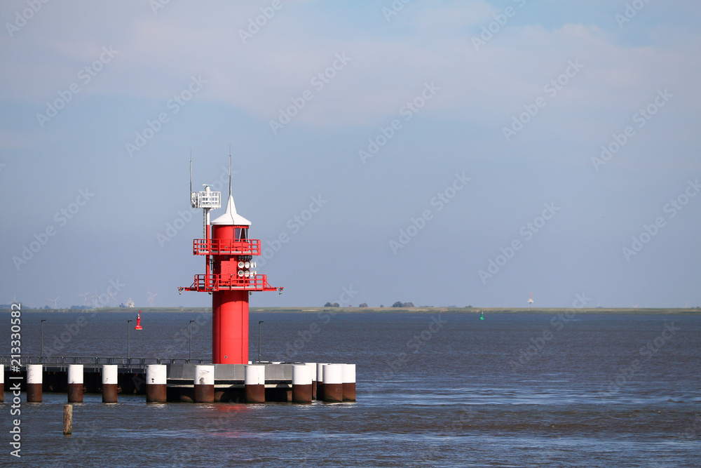 Lighthouse at the lock Kiel Canal in Brunsbuettel Lighthouse at the lock Kiel Canal in Brunsbuettel