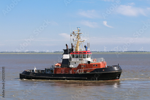 Pilot ship or tugboat on the sea