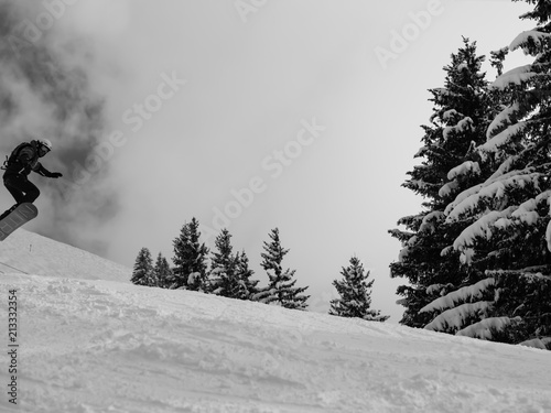 jumping snowboarder