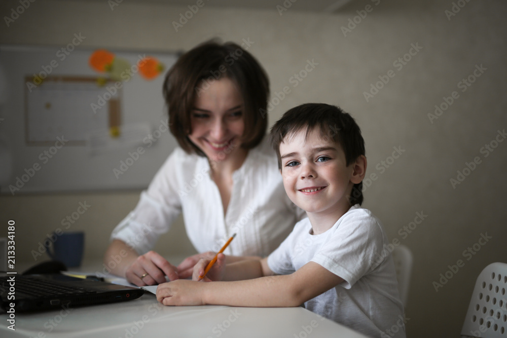 happy beauty mother engaged with son,real interior happy beauty mother engaged with son,real interior