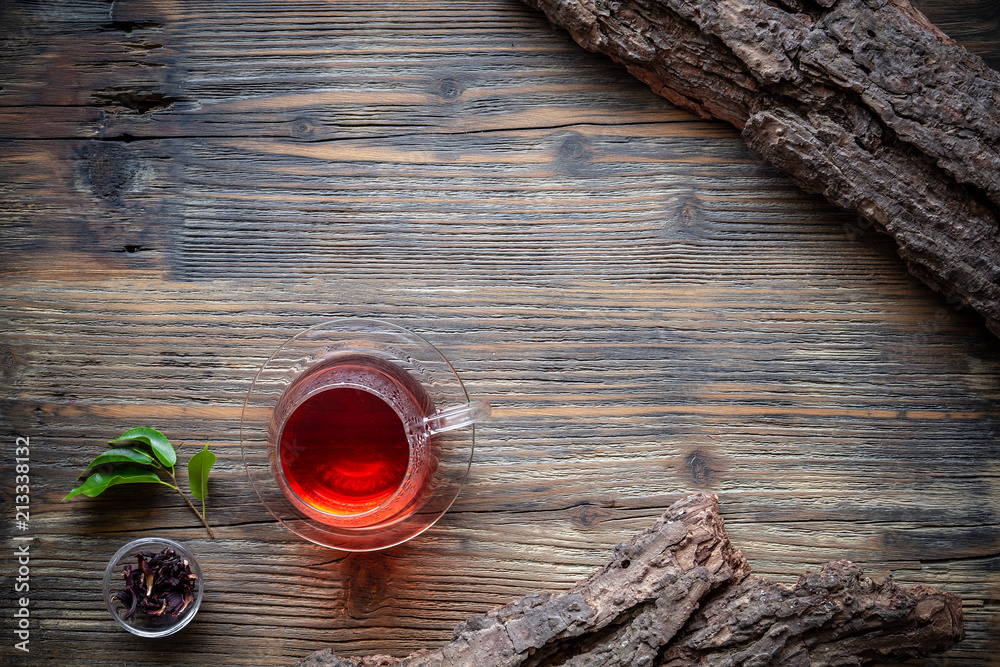 Cup of tea with fresh tea leaves Cup of tea with fresh tea leaves