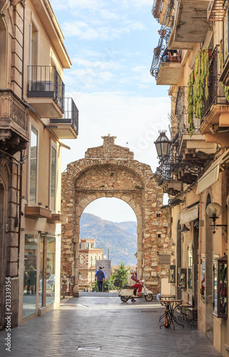 Messina Gate (Porta Messina) in Taormina. It is north entrance of  historical center of town which leads to  main street of Taormina photo
