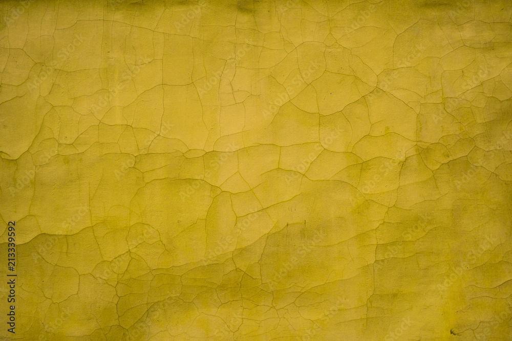 yellow texture old wall with cracks