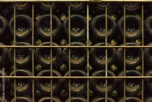 Stack of wine bottles in winery