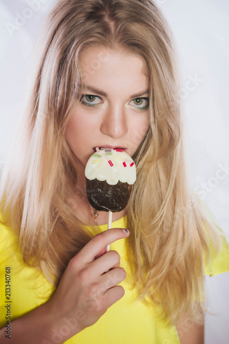 The girl eats ice cream
