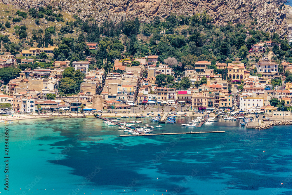 View of the seaside resort town of Mondello in Palermo, Sicily. White beach and turquoise crystal clear sea. HD View of the gulf from the top of Monte Pellegrino.