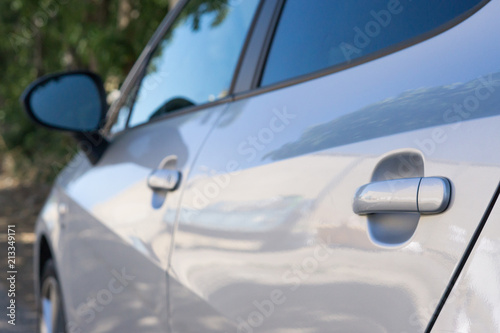 Side view of a gray vehicle